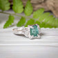 Raw Emerald and diamond engagement ring in Solid Sterling Silver, featuring a mint green Emerald and conflict-free diamonds.
