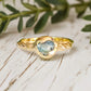 Australian Sapphire ring in solid 14k gold from the 'Pea in a Pod' collection, featuring a unique teal gemstone.