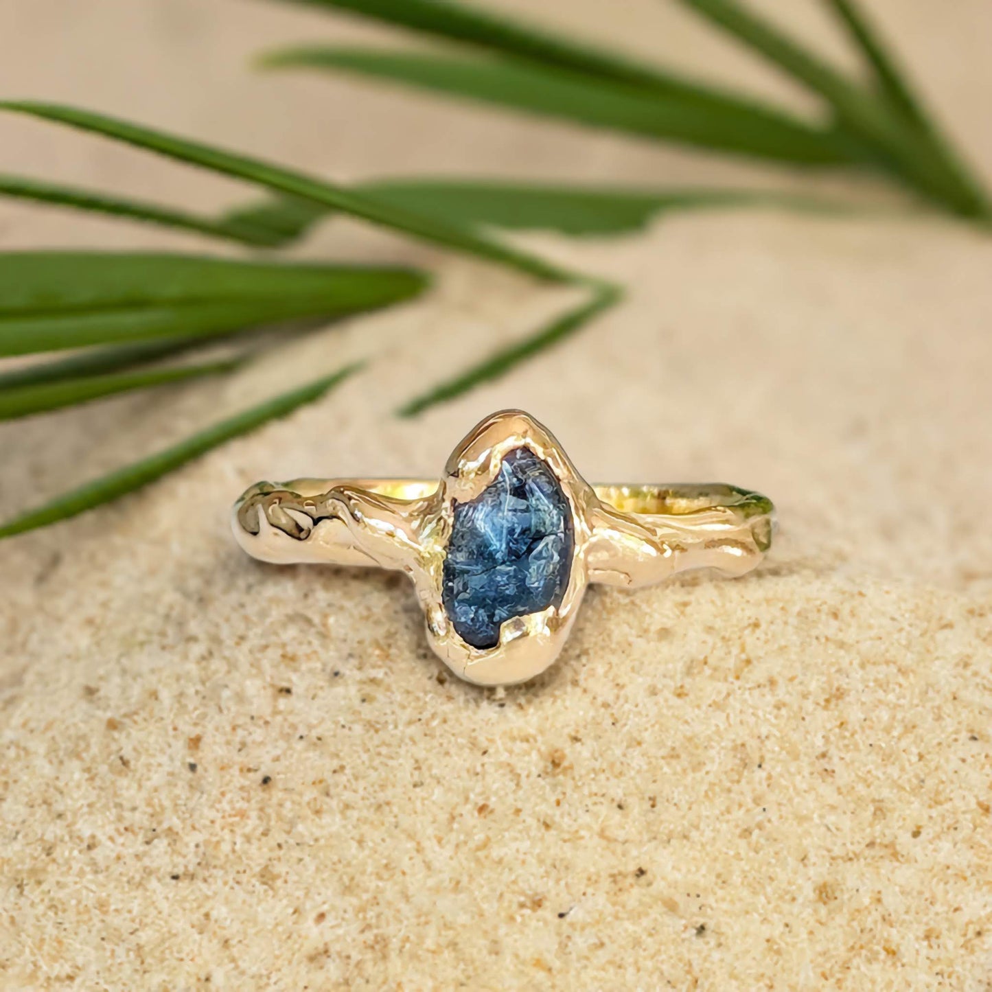 Australian Sapphire ring in solid 14k gold, featuring a stunning teal sapphire in an organic design. Perfect for engagement or promise.