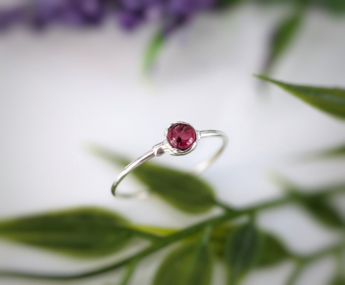 Dainty Ruby stacking ring in sterling silver featuring a natural 4mm Ruby gemstone, perfect for minimalist jewelry lovers.