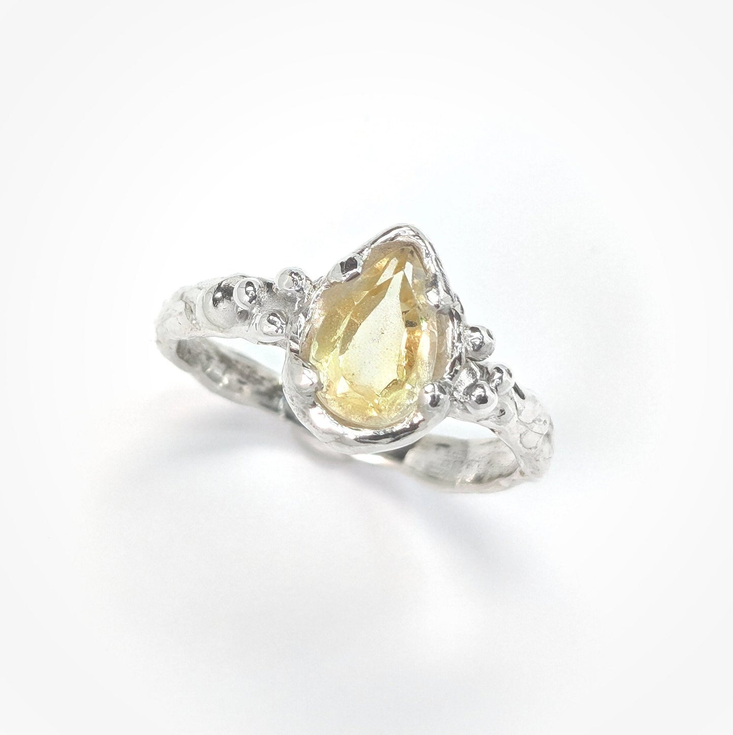 Natural citrine pear shape ring in textured sterling silver, perfect for engagement or November birthdays.