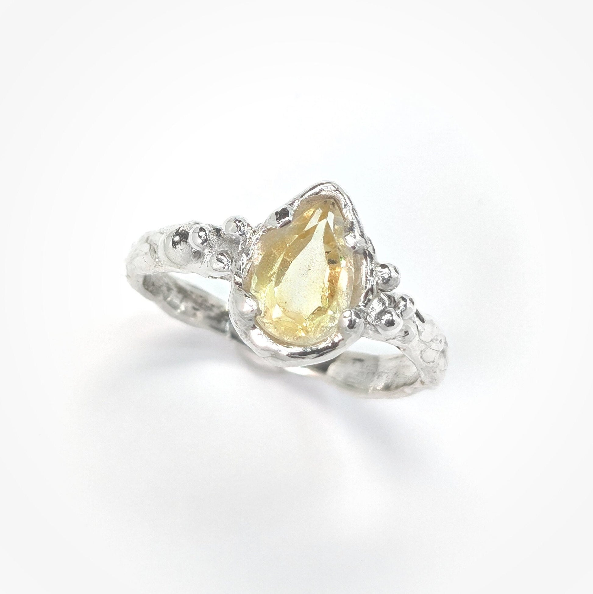 Natural citrine pear shape ring in textured sterling silver, perfect for engagement or November birthdays.