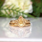 Handcrafted pear shape citrine ring in yellow gold with textured band, perfect for engagement or November birthdays.