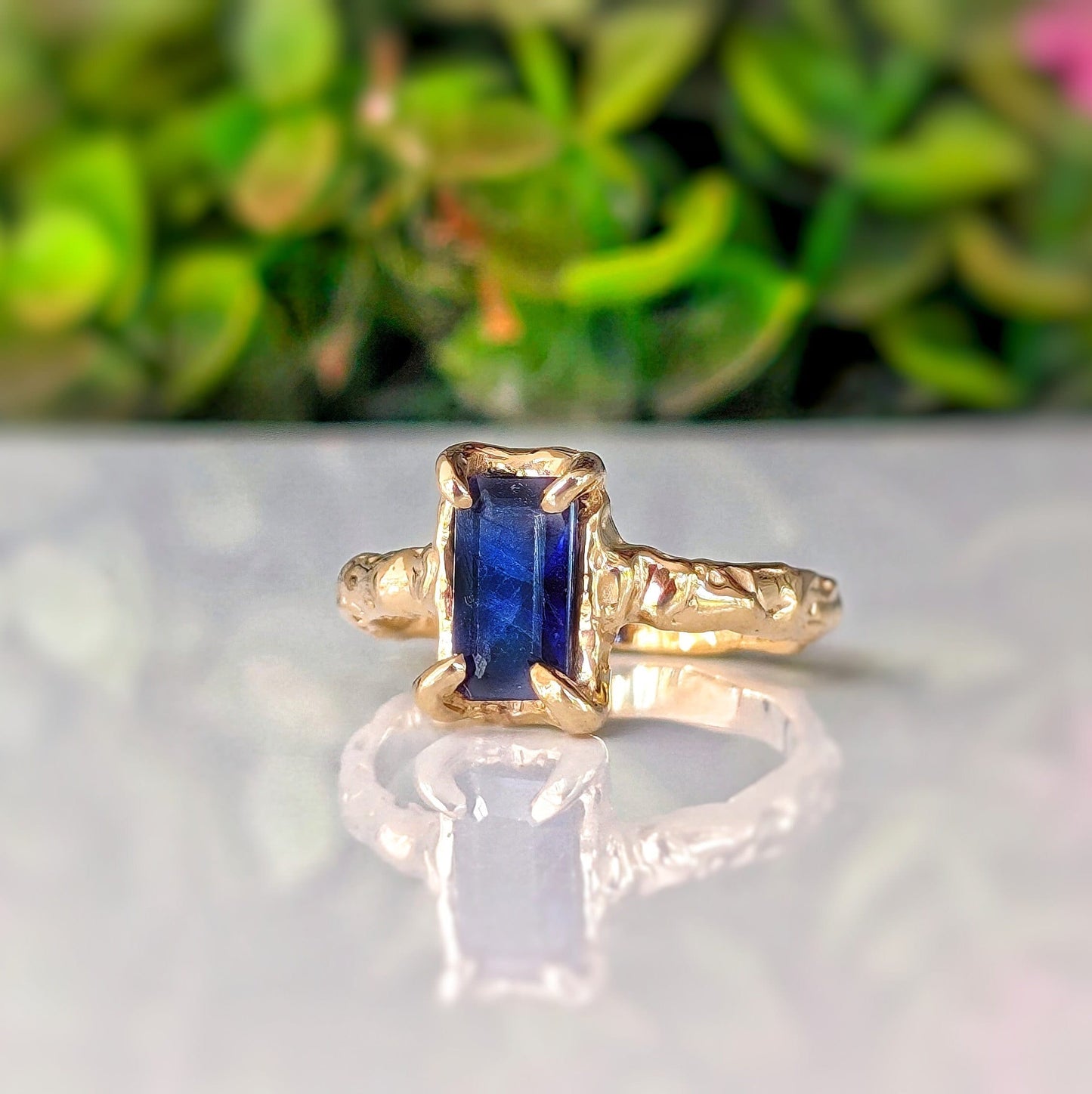 Blue Sapphire engagement ring in solid 14k gold with organic textured band, showcasing a stunning lab-created sapphire.