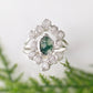 Moss Agate and raw diamond bridal ring set on sterling silver, featuring an elegant design and nature-inspired elements.