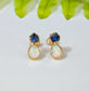 Dainty raw Sapphire and Opal stud earrings with gold setting, perfect for bridal or everyday elegance.