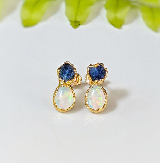 Handcrafted raw Sapphire and Opal stud earrings in gold, perfect for bridal or everyday wear.