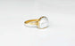 A Solid 14k Gold ring featuring a large Freshwater Pearl