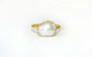 A Solid 14k Gold ring featuring a large Freshwater Pearl