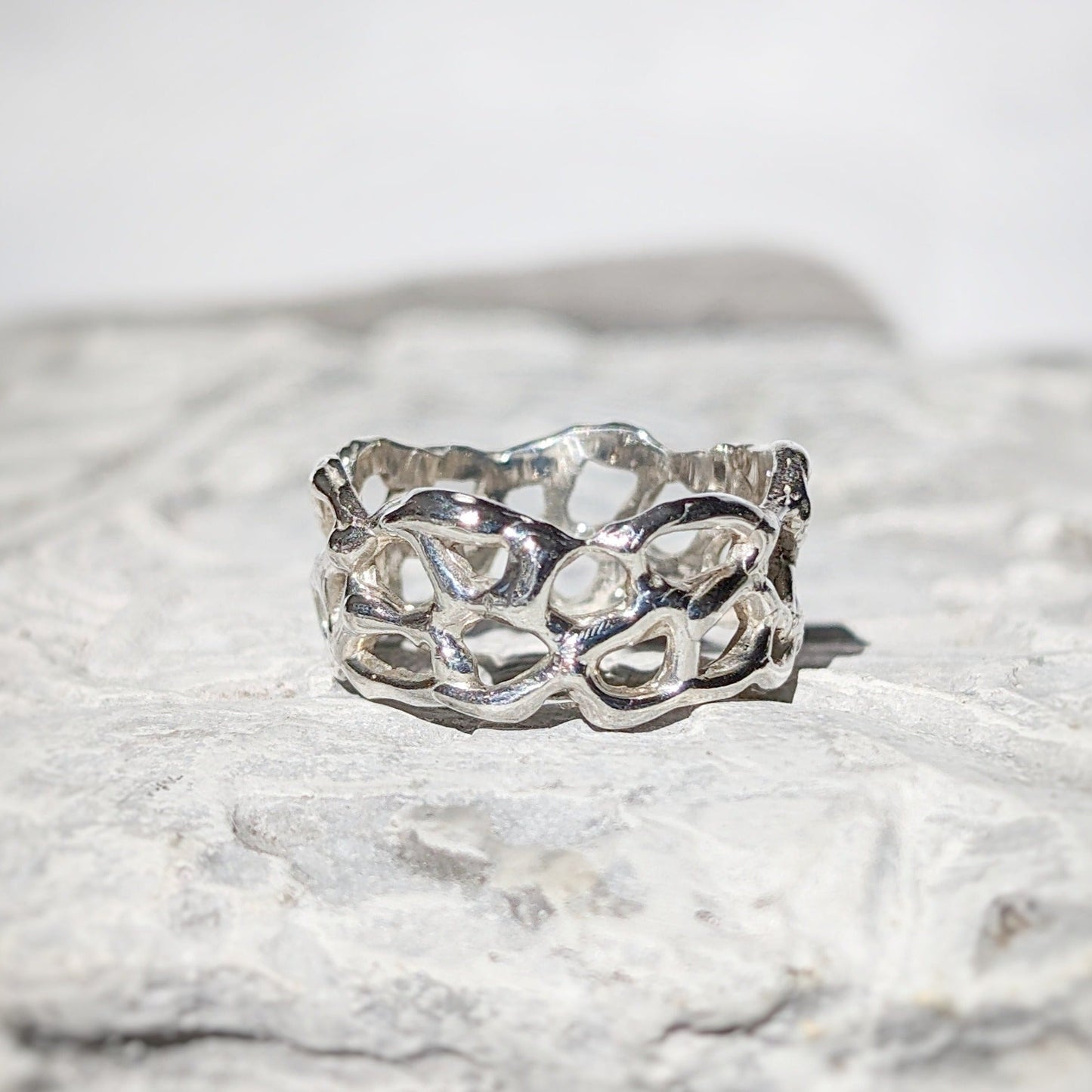 Handcrafted Molten Gold Honeycomb ring in solid 14k gold, showcasing an abstract, nature-inspired design.