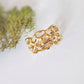 Molten Gold Honeycomb ring in solid 14k gold showcasing an abstract, nature-inspired design.
