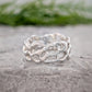 Molten Gold Honeycomb ring made of 14k gold, showcasing an abstract, nature-inspired design.