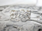 Molten Silver Honeycomb ring with an abstract, organic design, showcasing its unique hand-carved texture in solid silver.