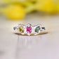 Natural multi Tourmaline silver ring featuring three colorful gemstones in a unique organic design.