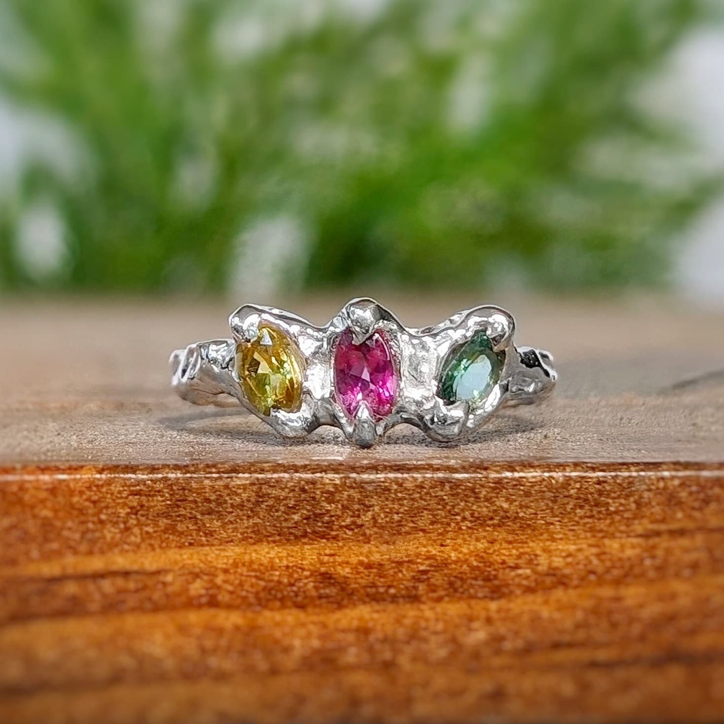 Natural multi Tourmaline silver ring featuring three colorful gemstones set in organic design.