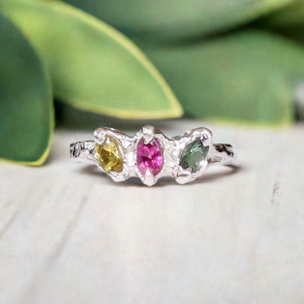 Natural multi Tourmaline silver ring featuring three colorful Tourmaline gemstones in a unique setting.
