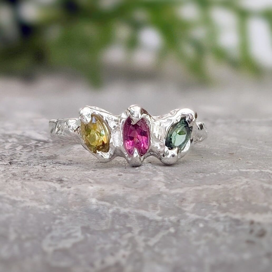 Natural multi Tourmaline Silver ring featuring three gemstones in yellow, pink, and green set in sterling silver.