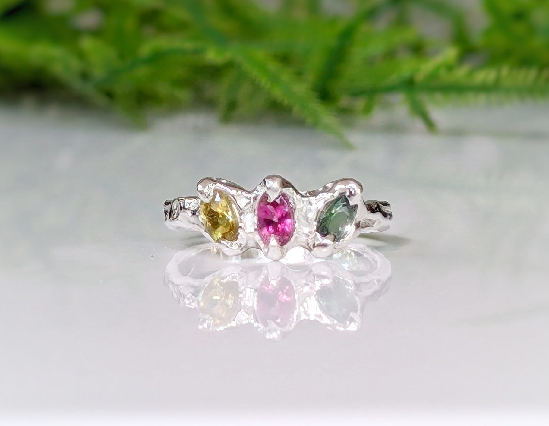 Natural multi Tourmaline sterling silver ring featuring three colorful gems in an organic design, reflecting timeless beauty.