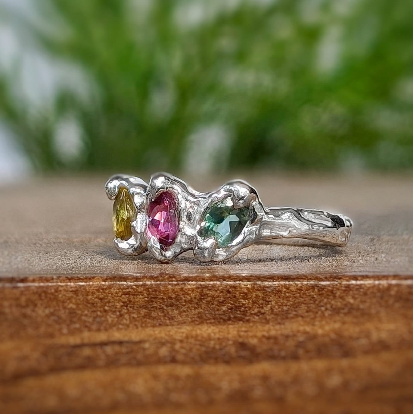 Natural multi Tourmaline and silver ring with three colorful gemstones in an organic design.