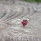 Handcrafted Rubellite Tourmaline ring in silver, featuring a unique organic textured band and a stunning pink gemstone.