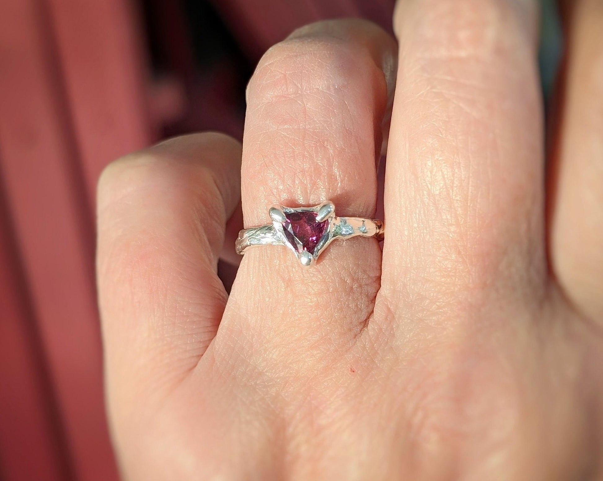 Handcrafted Rubellite Tourmaline ring in Sterling Silver, featuring an elegant pink stone on an organic textured band.