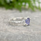 Natural Tanzanite ring showcasing a unique silver textured band, perfect for engagement or December birthdays.