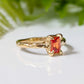 Radiant cut orange sapphire ring in solid 14k gold with unique textured band, perfect engagement or gift ring.