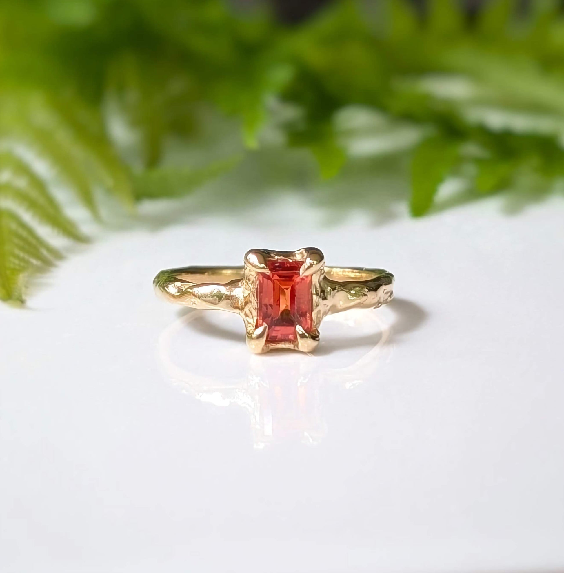 Orange Sapphire textured ring in Solid 14k Gold, handcrafted with a radiant cut gemstone on an organic band.