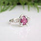 Handcrafted pink sapphire ring in textured sterling silver, featuring a pear-shaped rose cut gem, ideal for unique engagements.