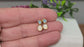 Dainty handcrafted raw Aquamarine and Opal stud earrings in gold settings, perfect for bridal or everyday wear.