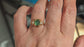 Raw emerald and diamond engagement ring in solid 14k gold, showcasing mint green emerald and conflict-free diamonds.