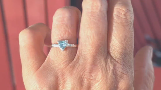 Solid Silver Aquamarine ring with trilliant shape gemstone, showcasing unique handcrafted design and organic textured band.
