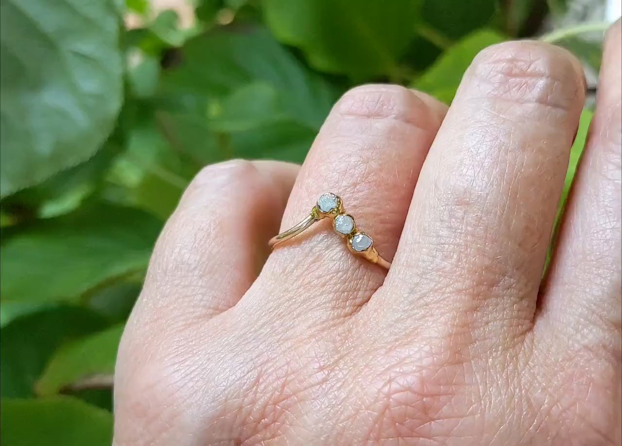 Handcrafted raw diamond Chevron engagement ring in 18k gold, featuring three conflict-free diamonds.