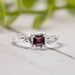 Red Garnet engagement ring in solid sterling silver with organic textured band, handcrafted elegance.