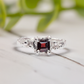 Red Garnet engagement ring in solid sterling silver with an organic textured band, featuring a square cut gemstone.