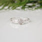 Rustic raw diamond engagement ring in recycled Sterling Silver, featuring unique molten texture and organic elegance.