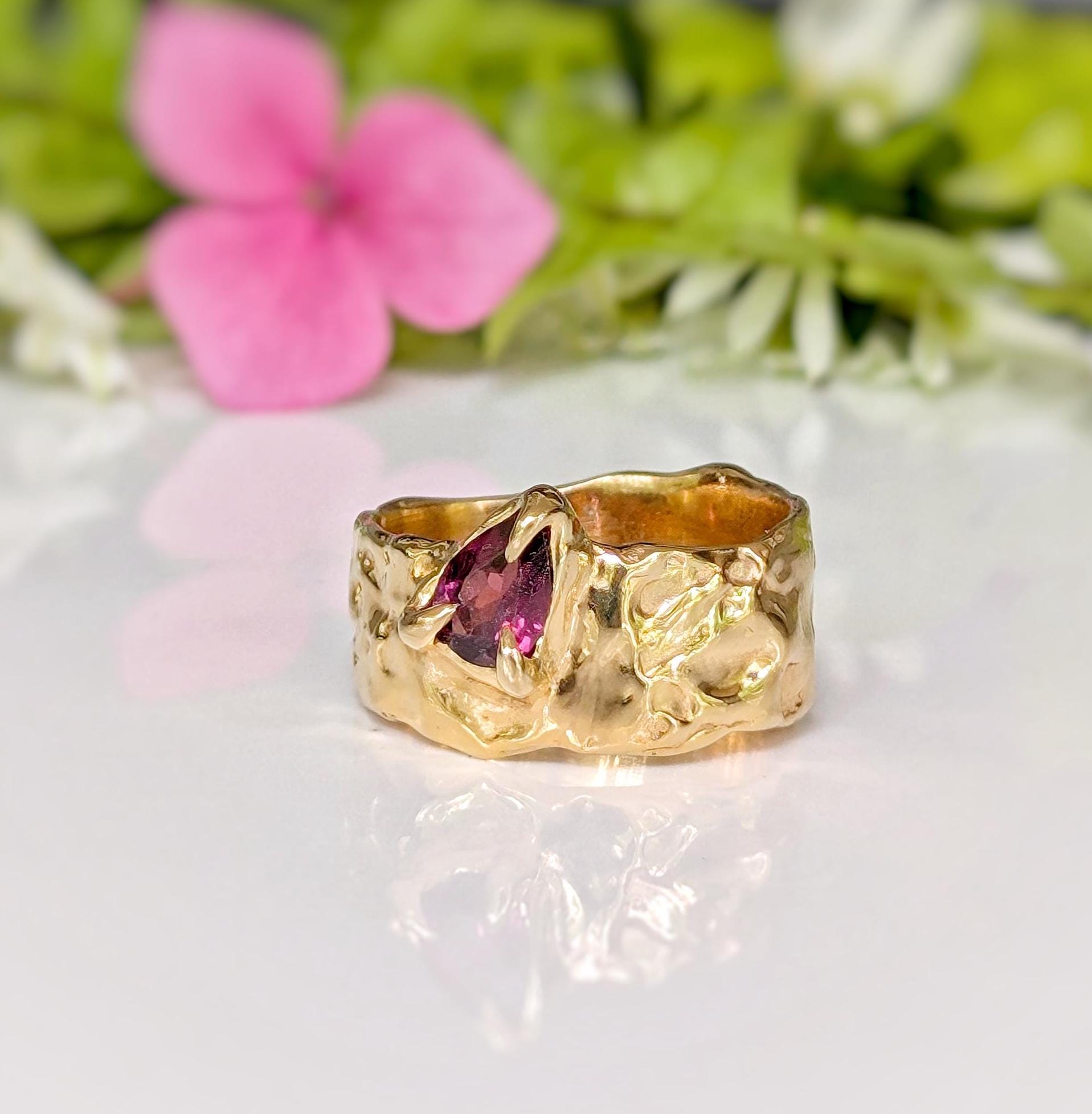 Handcrafted pink Rubellite Tourmaline ring in solid 14k gold with a textured organic design.
