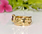 Handcrafted organic textured solid 14k gold ring featuring a pear-shaped Rubellite Tourmaline.