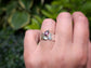 Handcrafted Rubellite Tourmaline ring in solid 14k gold, featuring a textured design and pear-shaped stone.