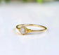 Rustic raw diamond engagement ring in solid 14k gold, featuring a unique crystal design for a romantic touch.