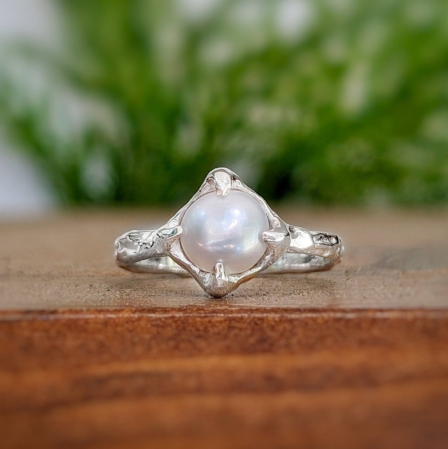 Textured Sterling Silver ring featuring a creamy-white Freshwater Keshi pearl, perfect for June birthdays.