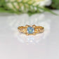 London Blue Topaz engagement ring in solid sterling silver, featuring an organic textured band and unique handcrafted design.