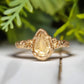 Beautiful pear-shaped citrine ring in solid 14k gold with an organic textured band, perfect for an engagement or anniversary.