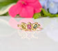 Solid Gold multi Tourmaline ring with three colorful gemstones in a unique design, perfect as a promise or engagement ring.