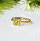 Solid 14k gold ring featuring a princess-cut peridot gemstone, perfect for unique engagements and August birthdays.