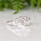 Rustic sterling silver engagement ring featuring three unique Salt & Pepper diamonds, perfect for a one-of-a-kind proposal.