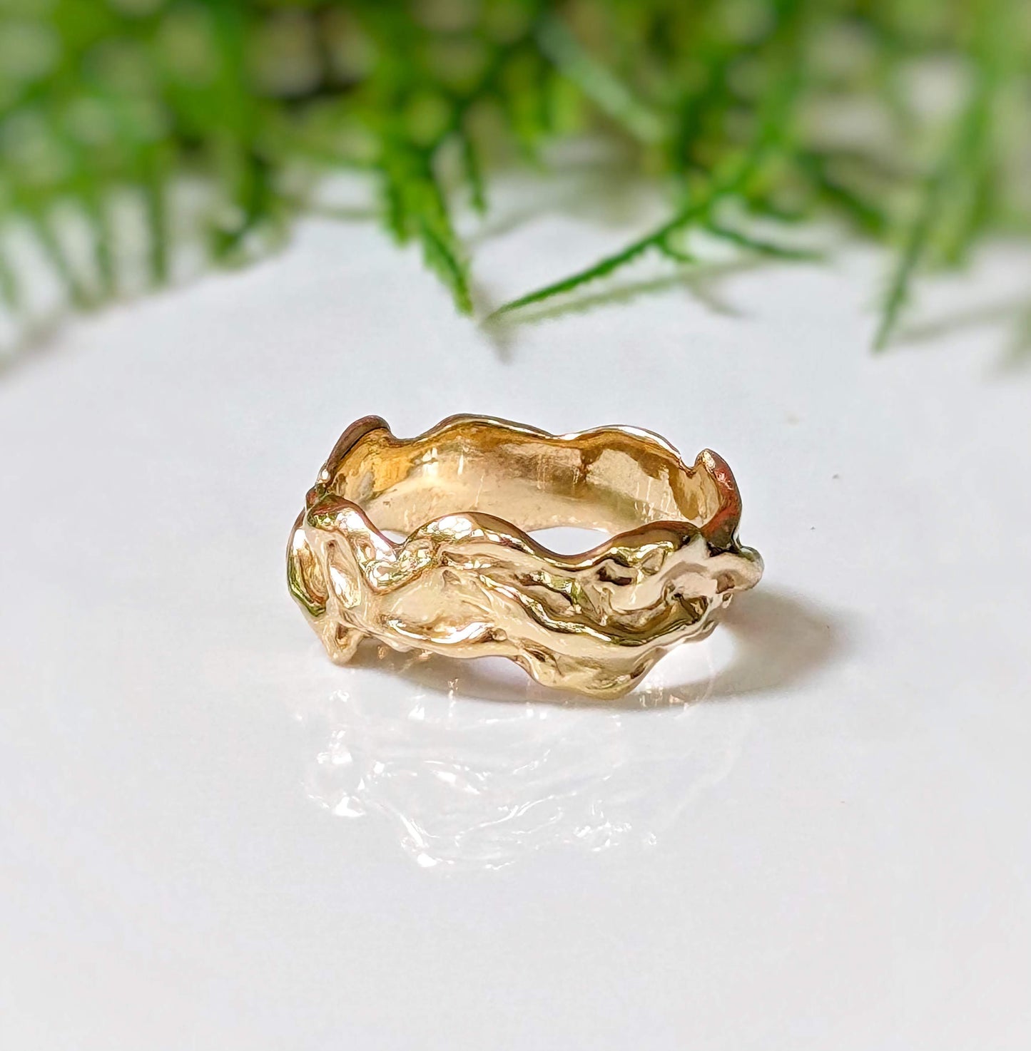 Textured Molten Gold wedding ring featuring a unique, handcrafted design in Solid 14k Gold.