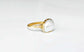 A Solid 14k Gold ring featuring a large Freshwater Pearl