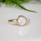 Freshwater pearl and raw diamond wedding ring set with gold band, showcasing romantic elegance.