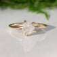 Raw diamond engagement ring set in rose gold, showcasing unique, natural beauty for a one-of-a-kind love.